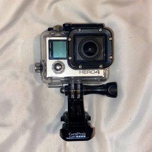 GoPro HERO4 that’s used but still functioning. Charger not included